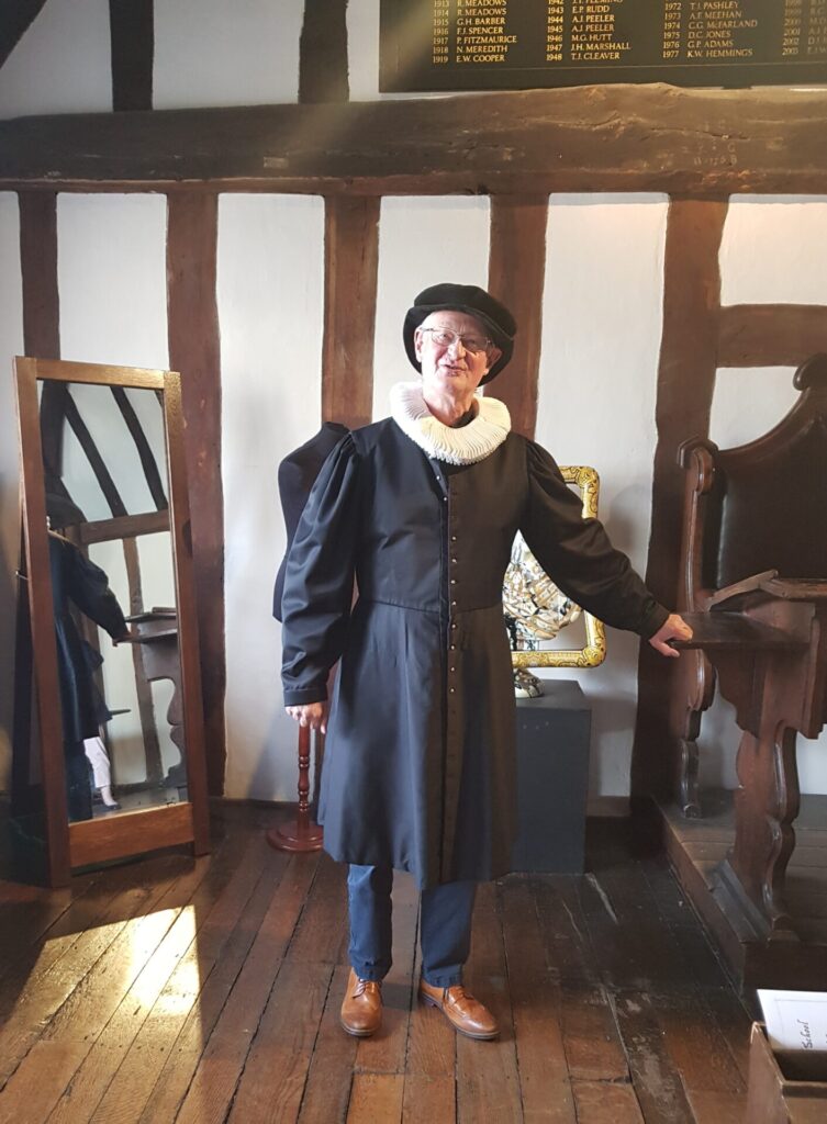 John Faulkner dressed as a Tudor schoolmaster